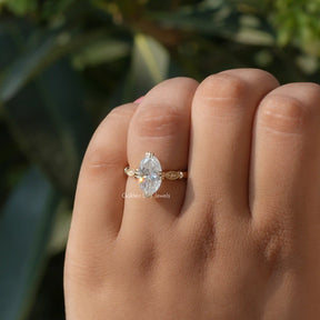 View of Colorless Moval Cut Moissanite Ring In finger