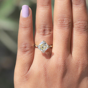 Detailed View Of Cushion Cut Moissanite Ring In Yellow Gold