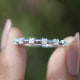 Farbloser Moissanit-Halb-Eternity-Ring im Prinzessschliff