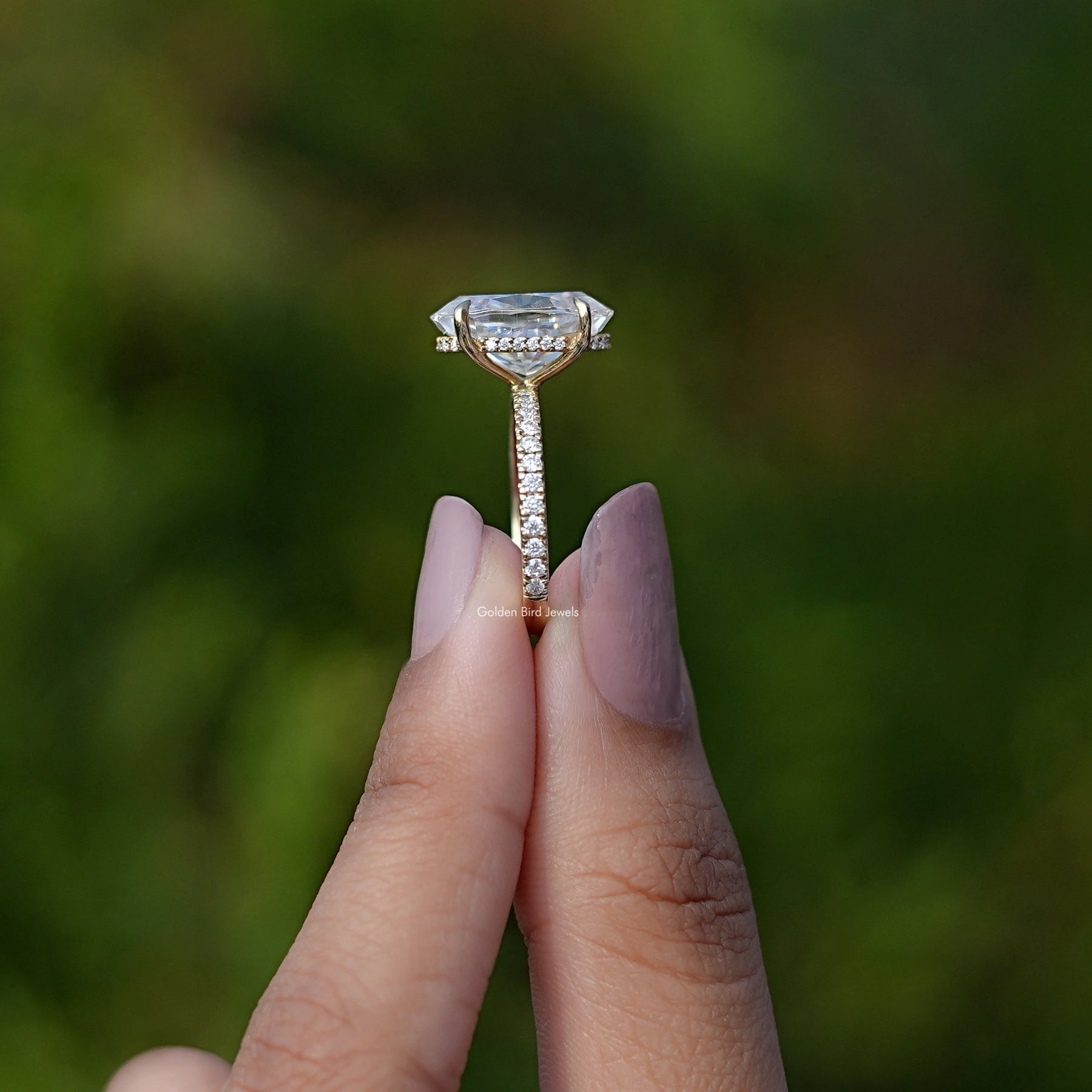 Side View of Ice Oval Cut Moissanite Ring In finger