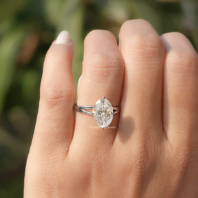 View of Crushed Ice Oval Cut Moissanite Engagement Ring In finger