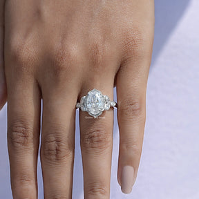 Detailed View of Oval Cut Moissanite Milgrain Accent Ring In White Gold