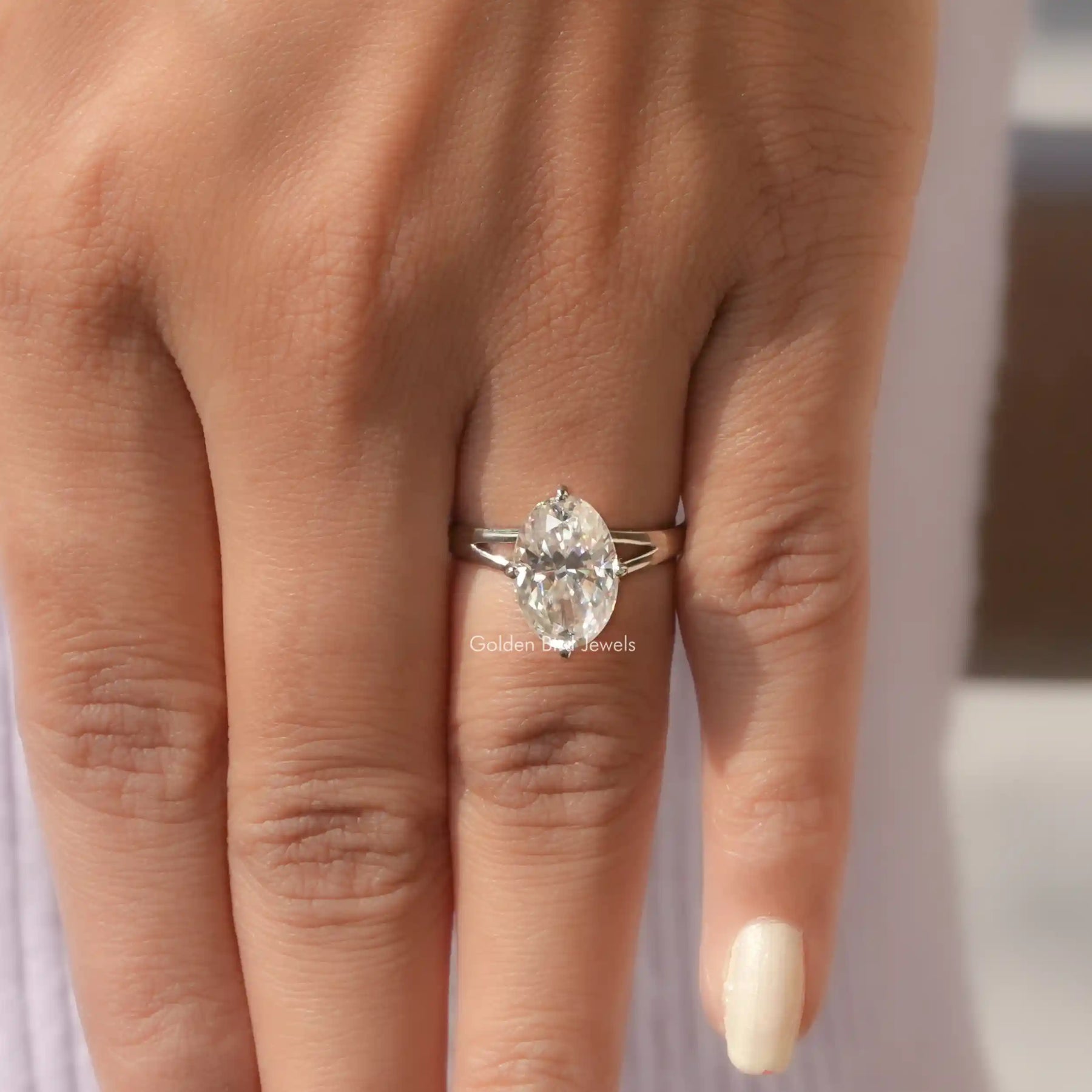 Close-Up View of Crushed Ice Oval Cut Moissanite Ring In White Gold        