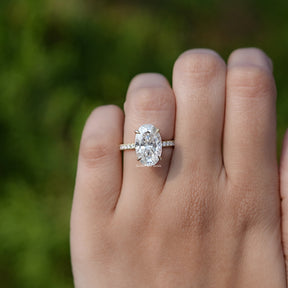 View of Crushed Ice Oval Moissanite Solitaire Accent Ring In Finger