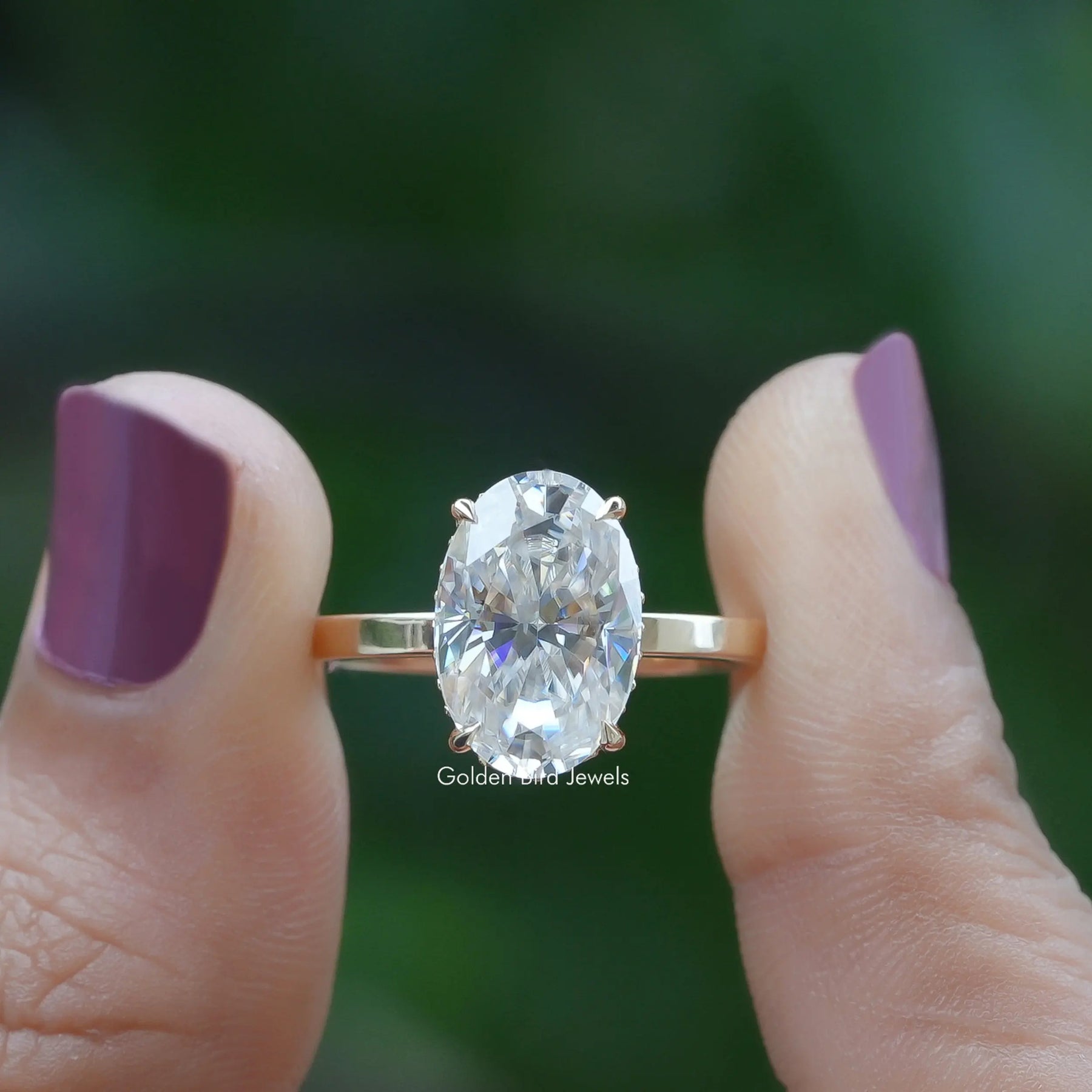 Oval Cut Solitaire Hidden Halo Ring