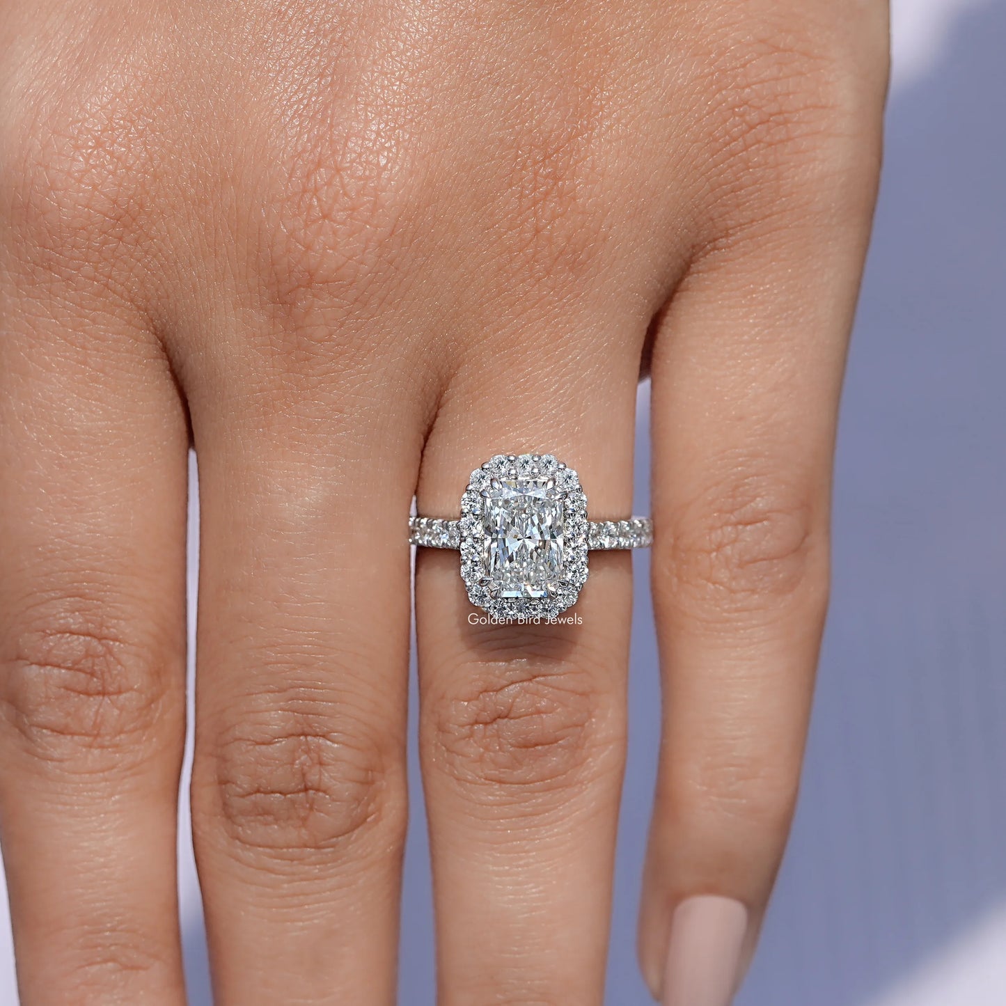 In finger front view of Lab Diamond Halo Accent Engagement Ring in unique shape