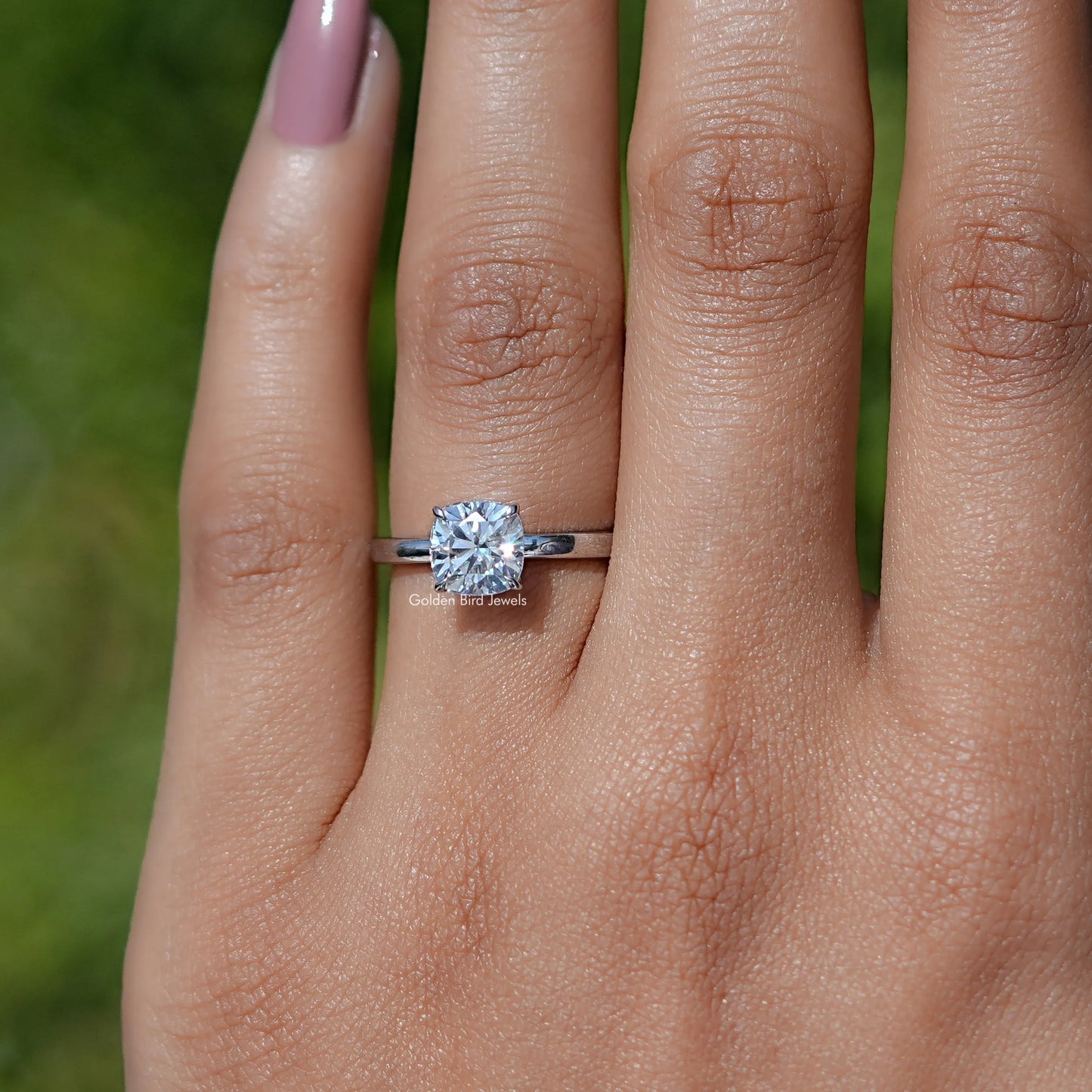 In finger view of Cushion Cut Moissanite Solitaire Ring