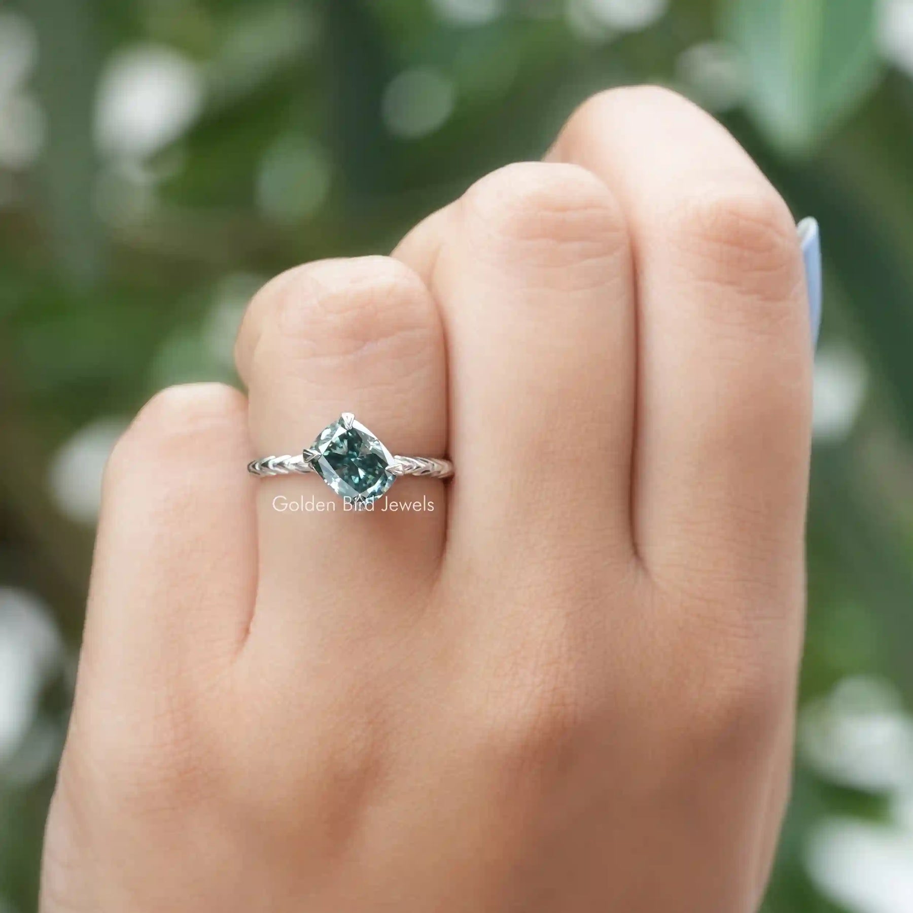 Detailed View Of Green Cushion Cut Moissanite Engagement Ring In White Gold