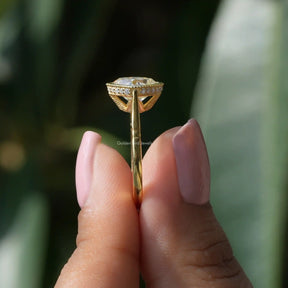 Side View of Cushion Cut Solitaire Moissanite Ring In two fingers