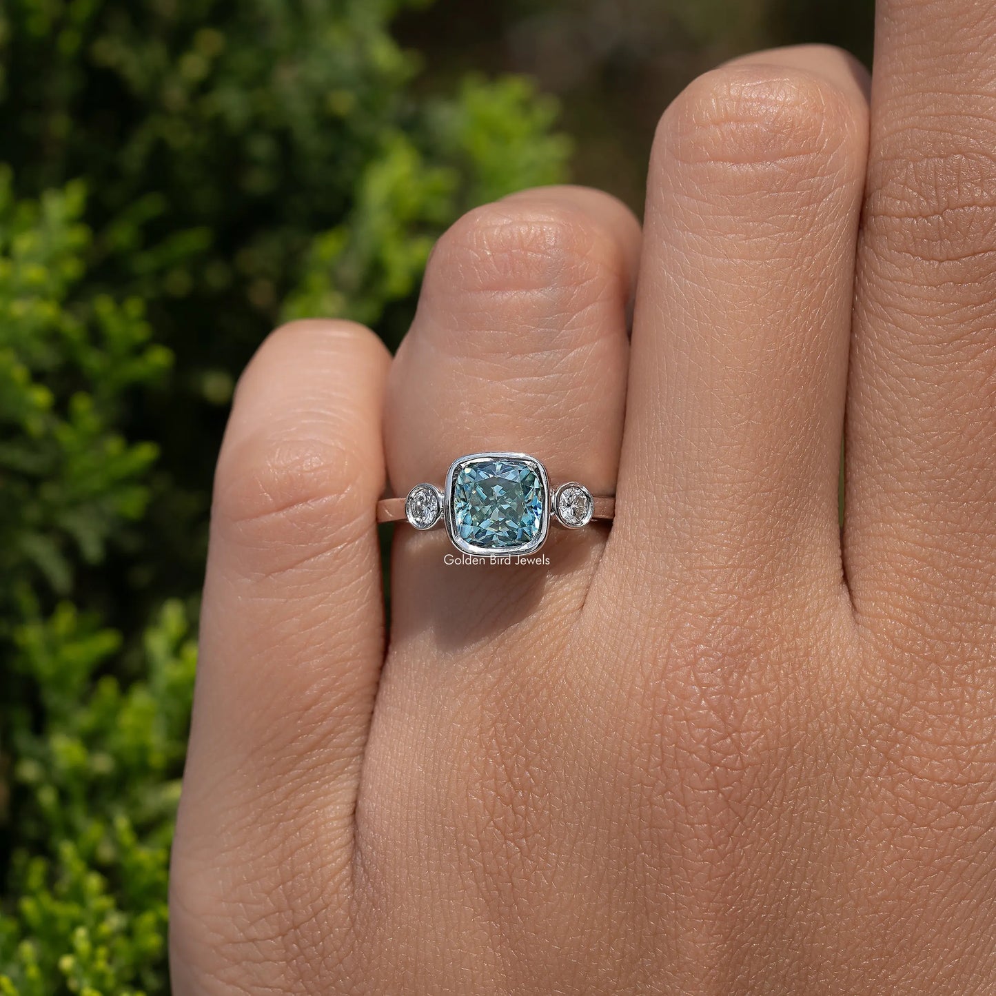 In finger view of Cushion Cut Moissanite Engagement Ring