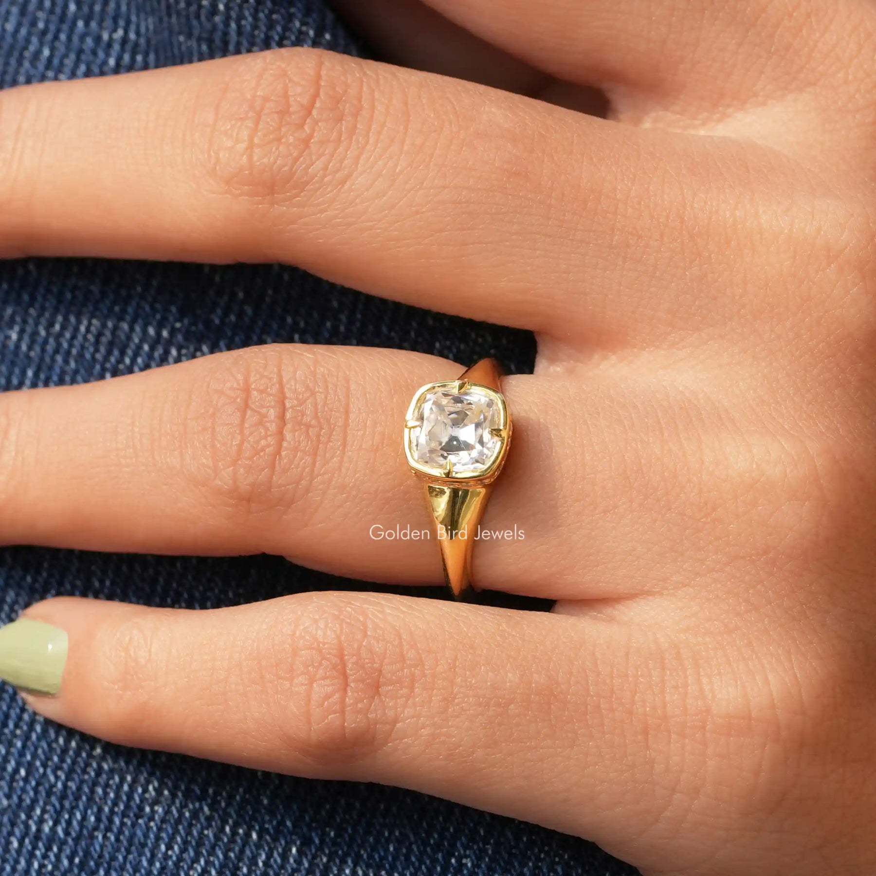 View Of Cushion Cut Moissanite Solitaire Ring In Yellow Gold