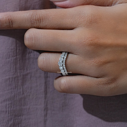 Curved double-row eternity band ring, close-up of small round stones on side