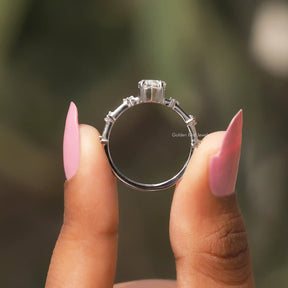 Back View A Dutch Marquise Cut Engagement Ring In two fingers