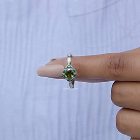In finger front View of Oval Cut Gemstone Engagement Ring In White Gold
