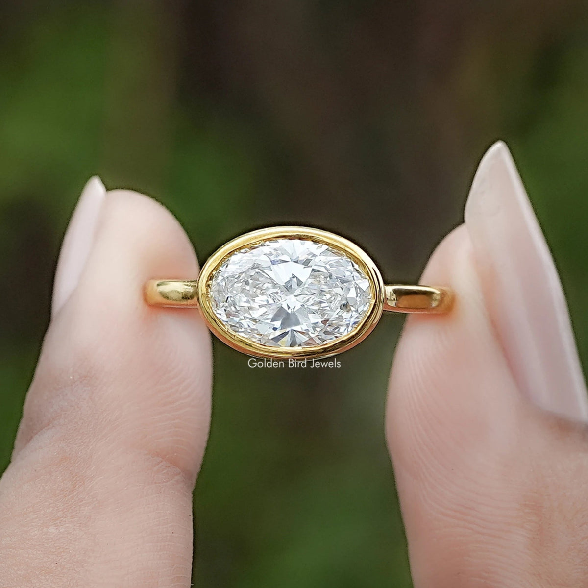 East West Oval Cut Lab Diamond Bezel Set Ring