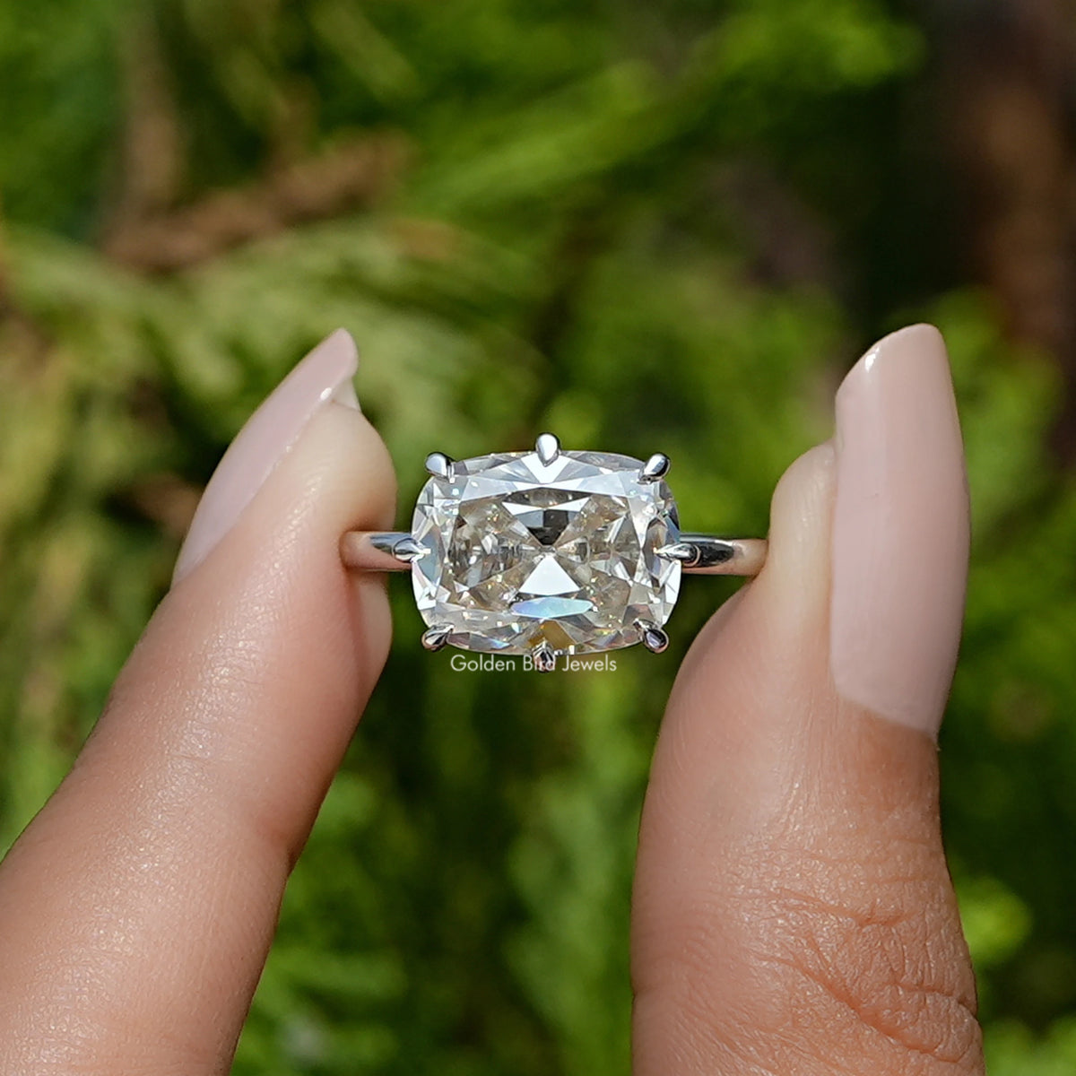 Front View of Old Mine Cushion Cut Moissanite Ring In two Fingers