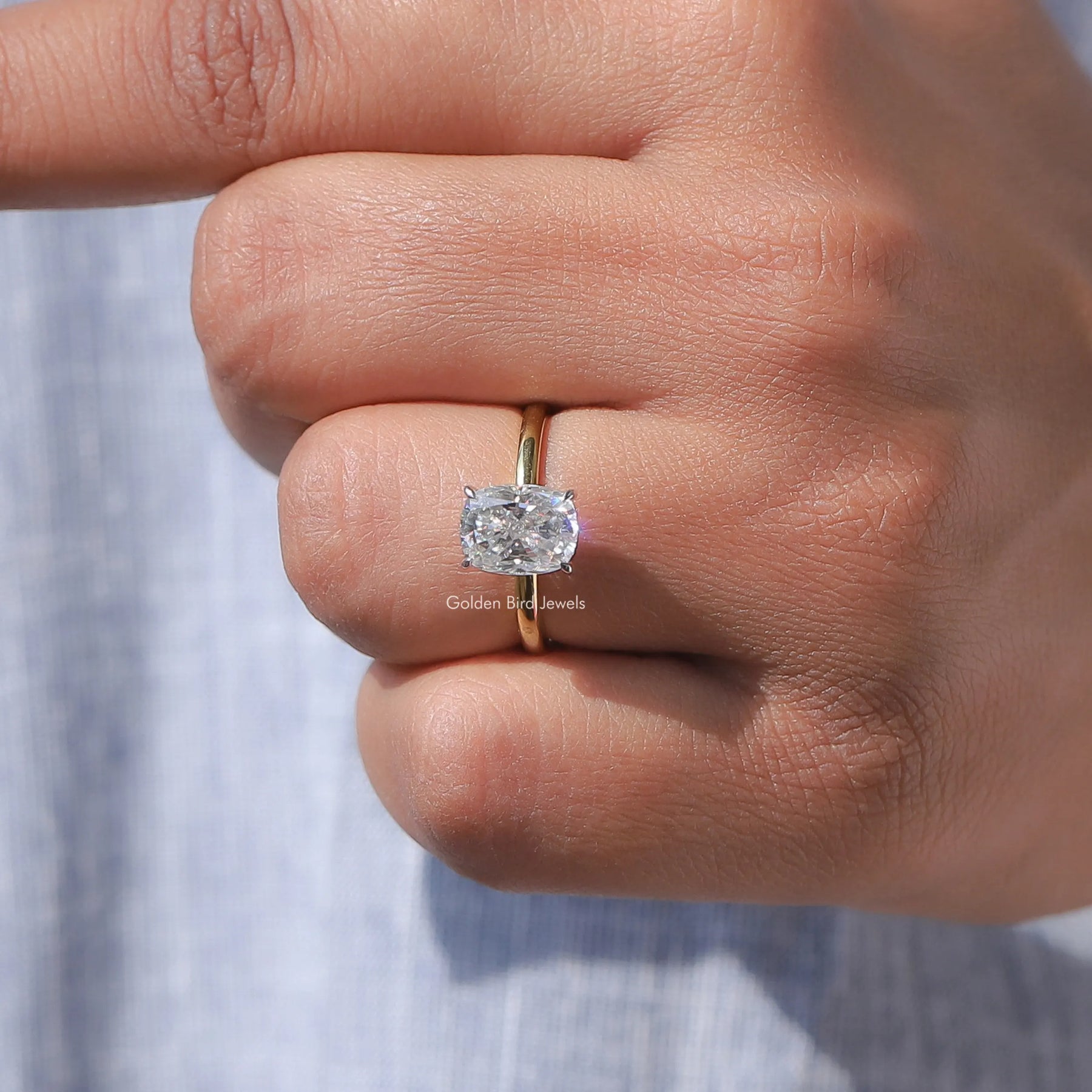 View of Cushion Cut Diamond Ring In Yellow Gold