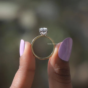 Back View of Cushion Cut Lab Diamond Solitaire Ring In two fingers