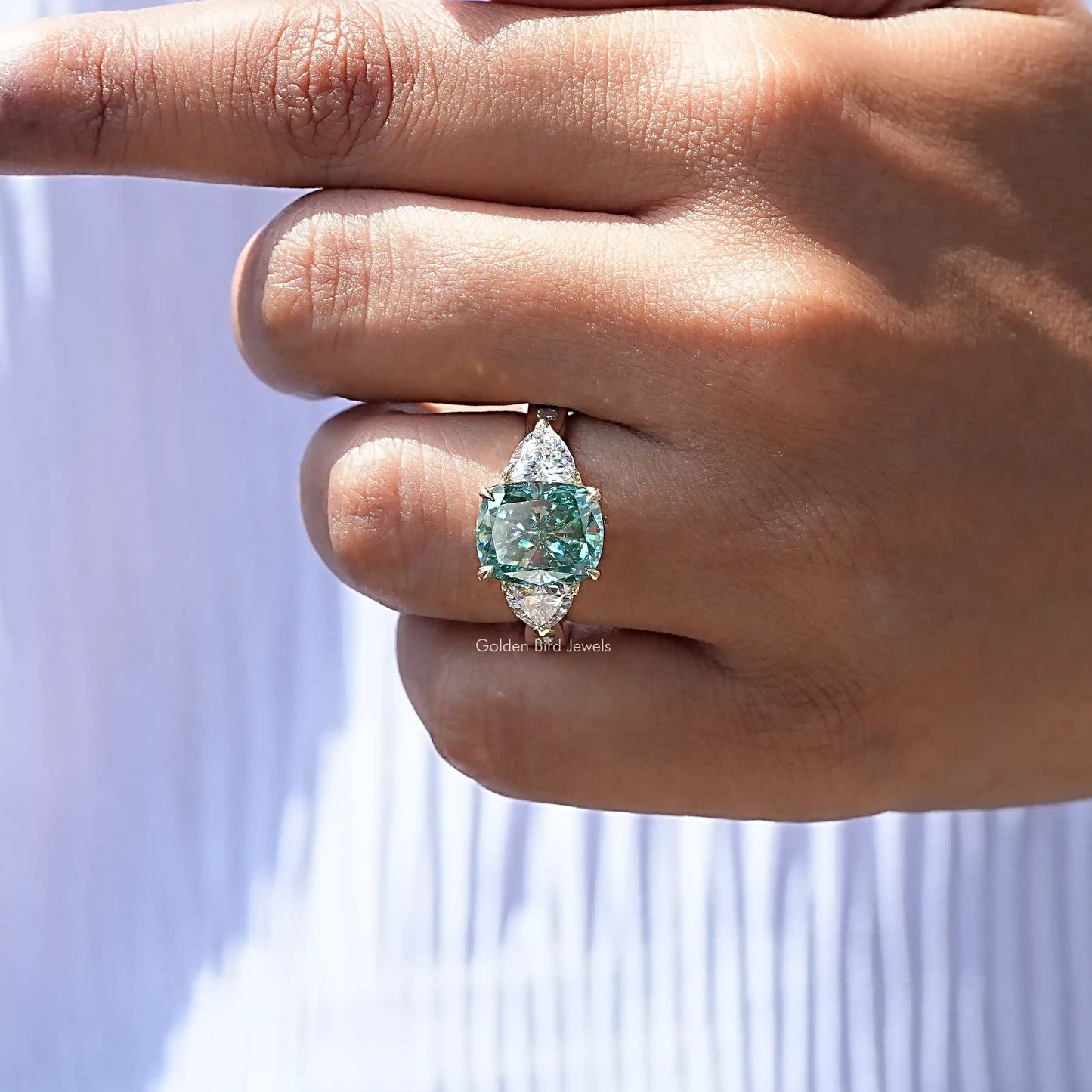 View of Moissanite Cushion Cut 3 Stone Ring In finger