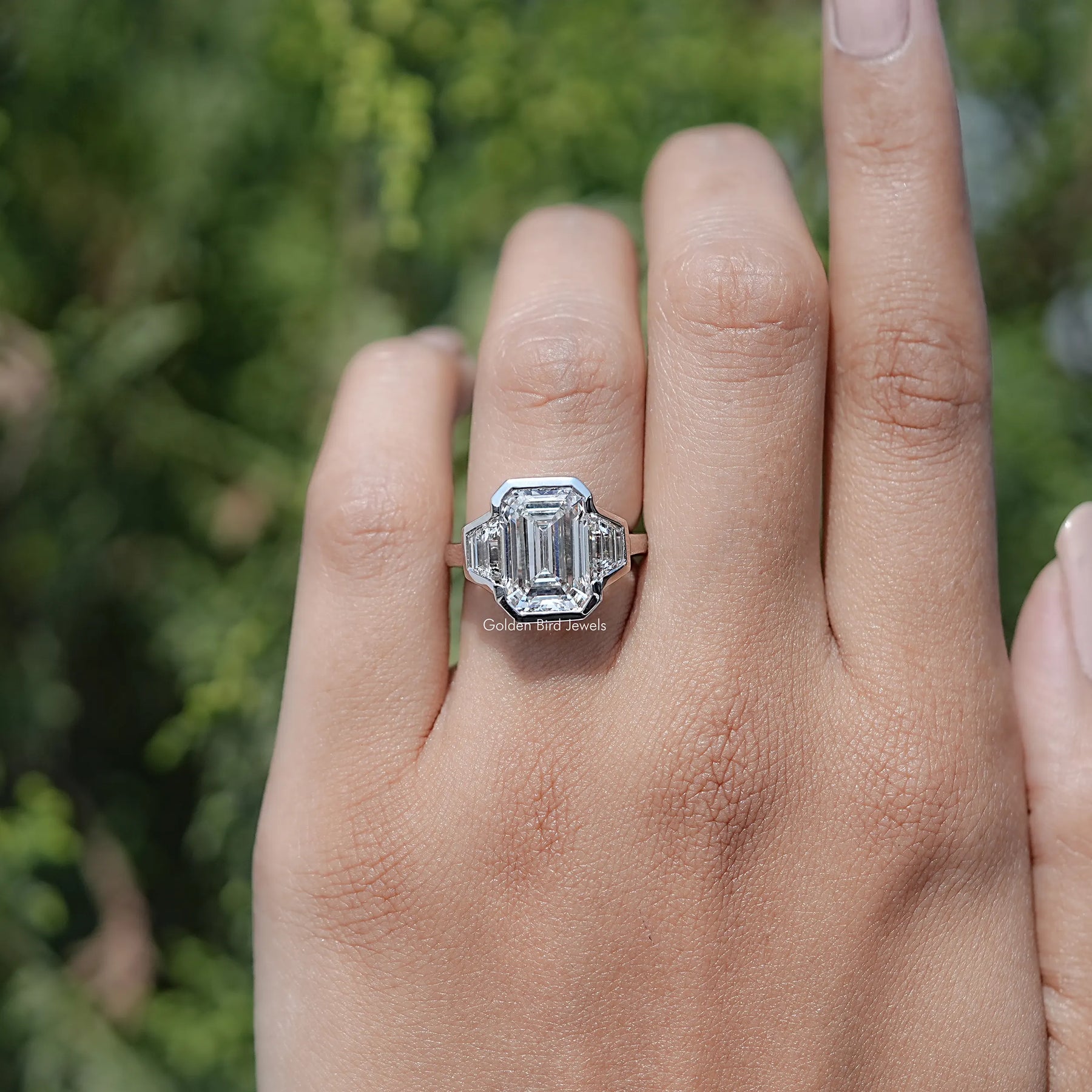 Bezel Set Emerald Cut Lab Diamond Three Stone Ring