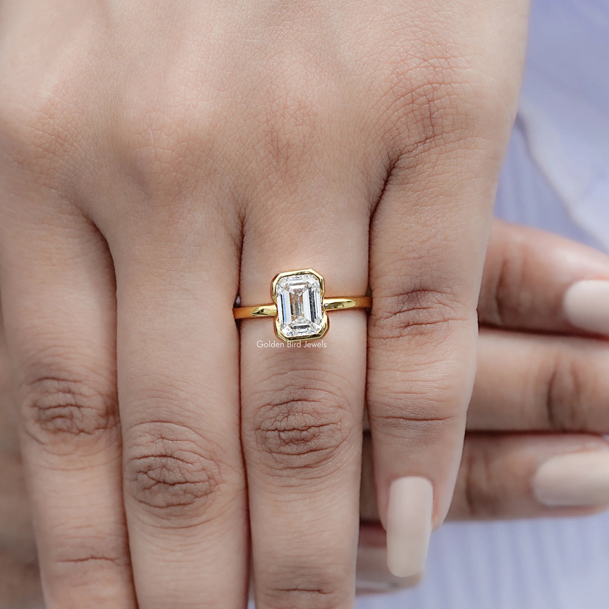 Top view of Emerald Cut Diamond Bezel Set Solitaire Ring