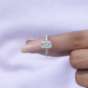 In finger front View of Emerald Cut Diamond Solitaire Ring