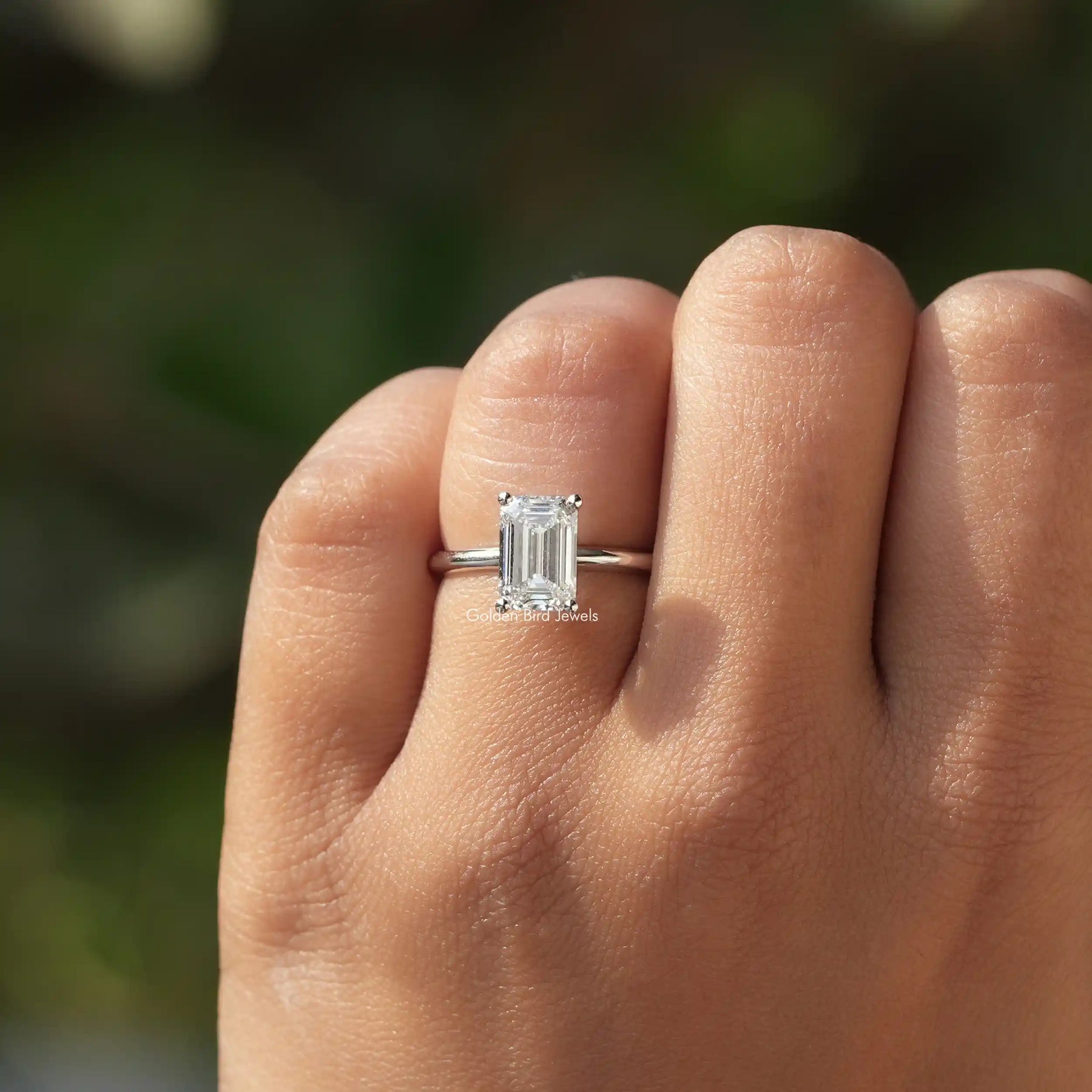 Detailed View Of Emerald Cut Diamond Engagement Ring In White Gold