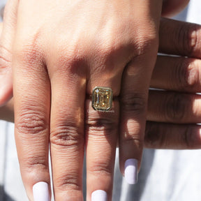 Solitaire Moissanite Engagement Ring In finger