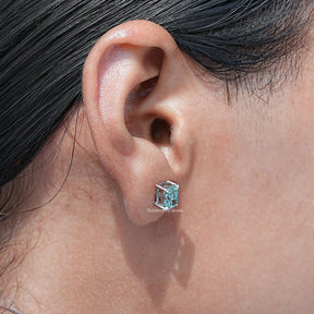 Side View Of Solid Blue elongated cushion Cut moissanite Stud Earrings