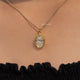 In neck View Of Old Mine Oval Moissanite Pendant