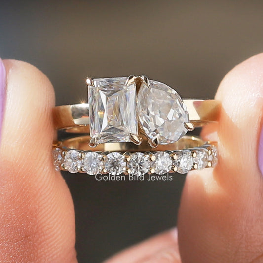 Ring im Birnen- und Kreuzschliff mit passendem Band