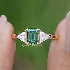 Emerald And Triangle Moissanite Three Stone Ring
