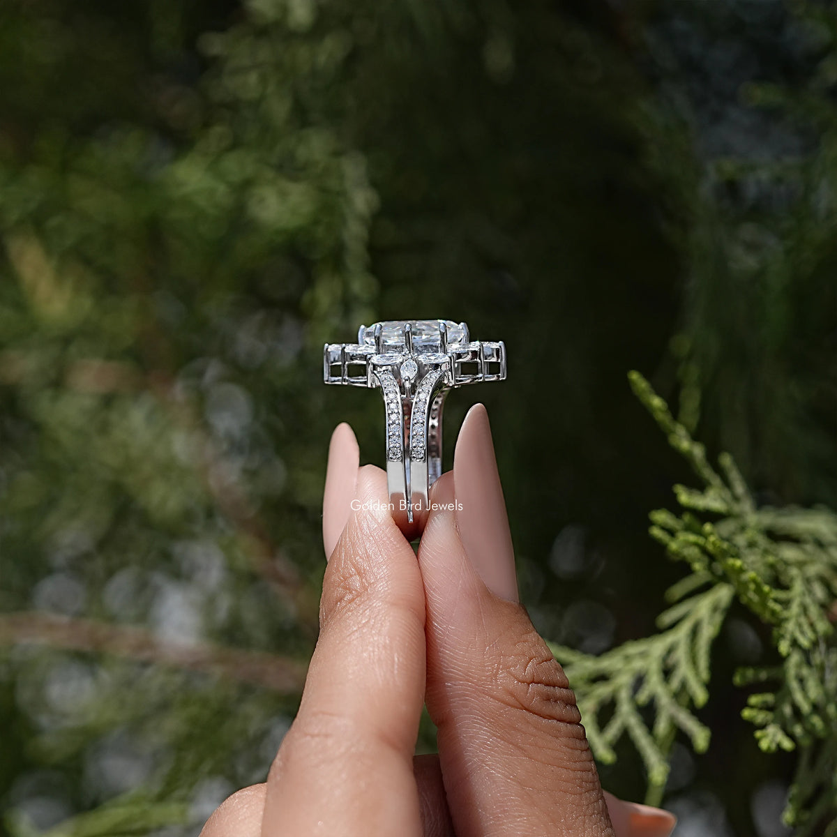 Marquise moissanite engagement ring with halo and prong-set shoulders, top view