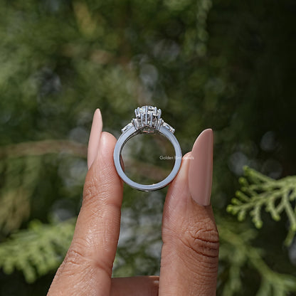 Sterling silver marquise moissanite ring with cathedral-style setting, viewed from back