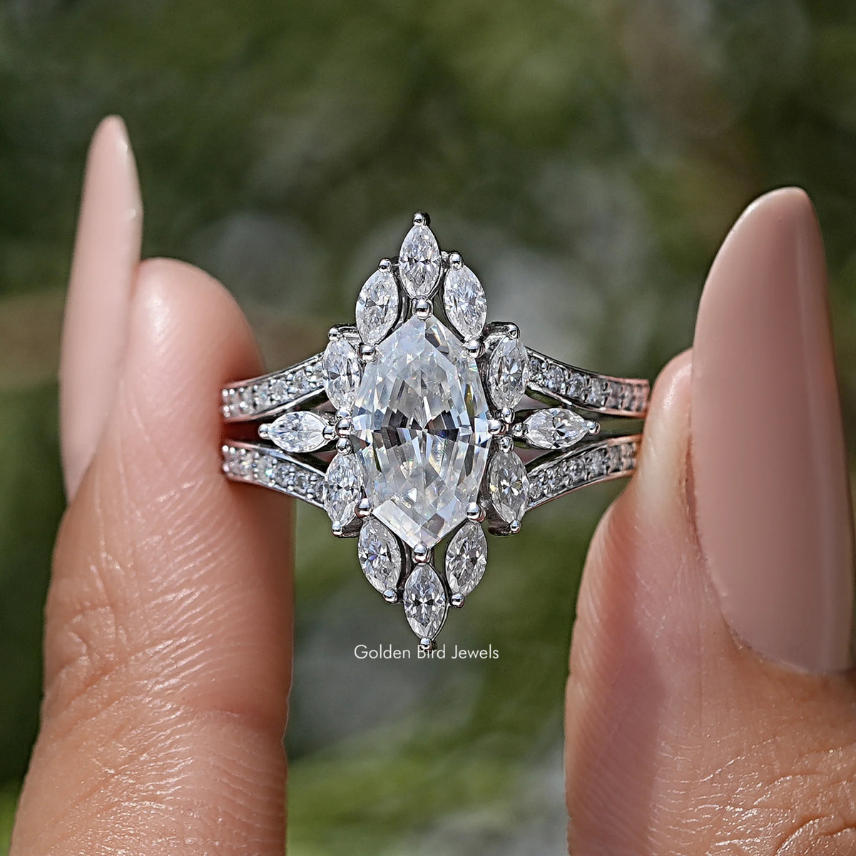 Marquise moissanite engagement ring with halo and split band, prong-set center stone