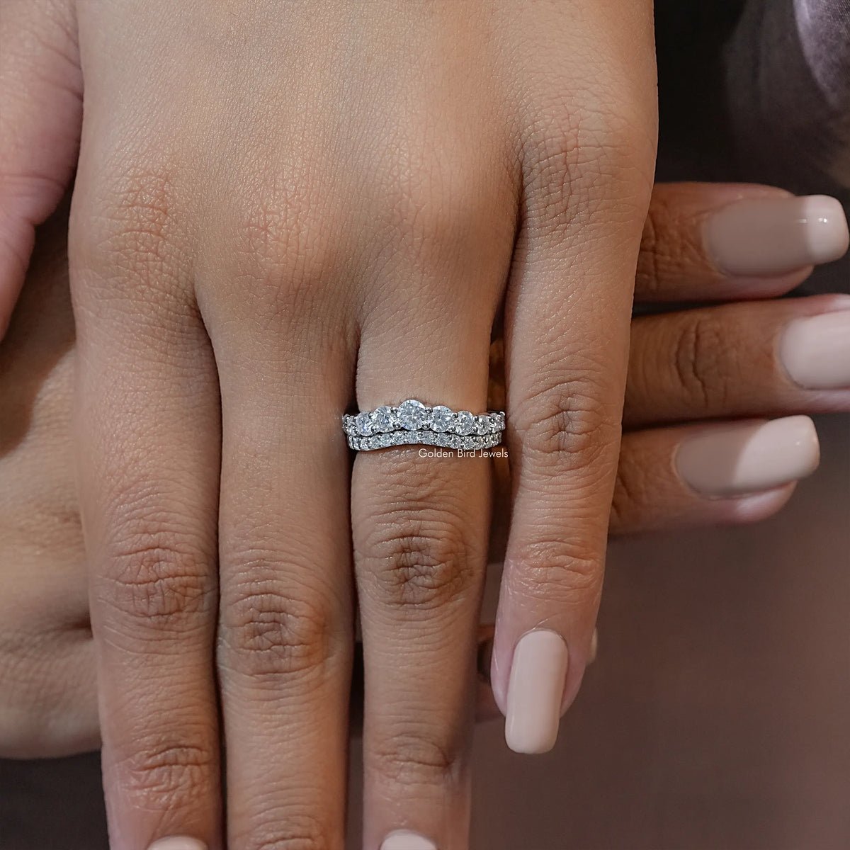 Curved double-row eternity band ring with round clear stones on silver-tone band