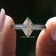 Off White Moval Cut Moissanite Accent Ring