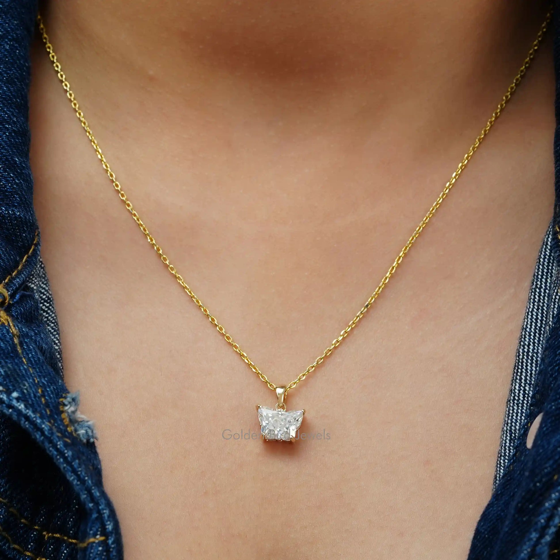 In neck view of Butterfly cut statement moissanite halo pendant 