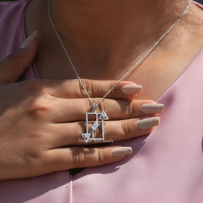 [This emerald cut moissanite pendant made of white gold]-[Golden Bird Jewels]