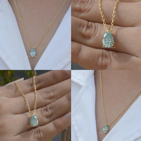 [Collage of pear cut moissanite pendant]-[Golden Bird Jewels]