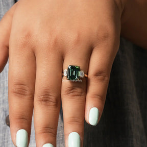 Detailed View Of Green Emerald Cut Moissanite Engagement Ring In White Gold