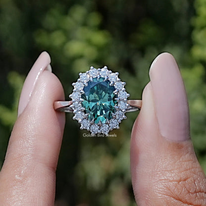 Front view of Green Oval Cut Moissanite Halo Engagement Ring