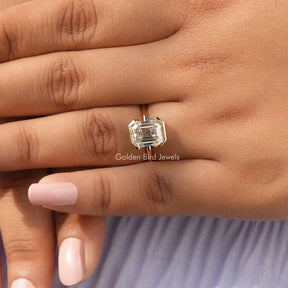 View of Emerald Cut Solitaire Moissanite Ring Engagement Ring In Finger