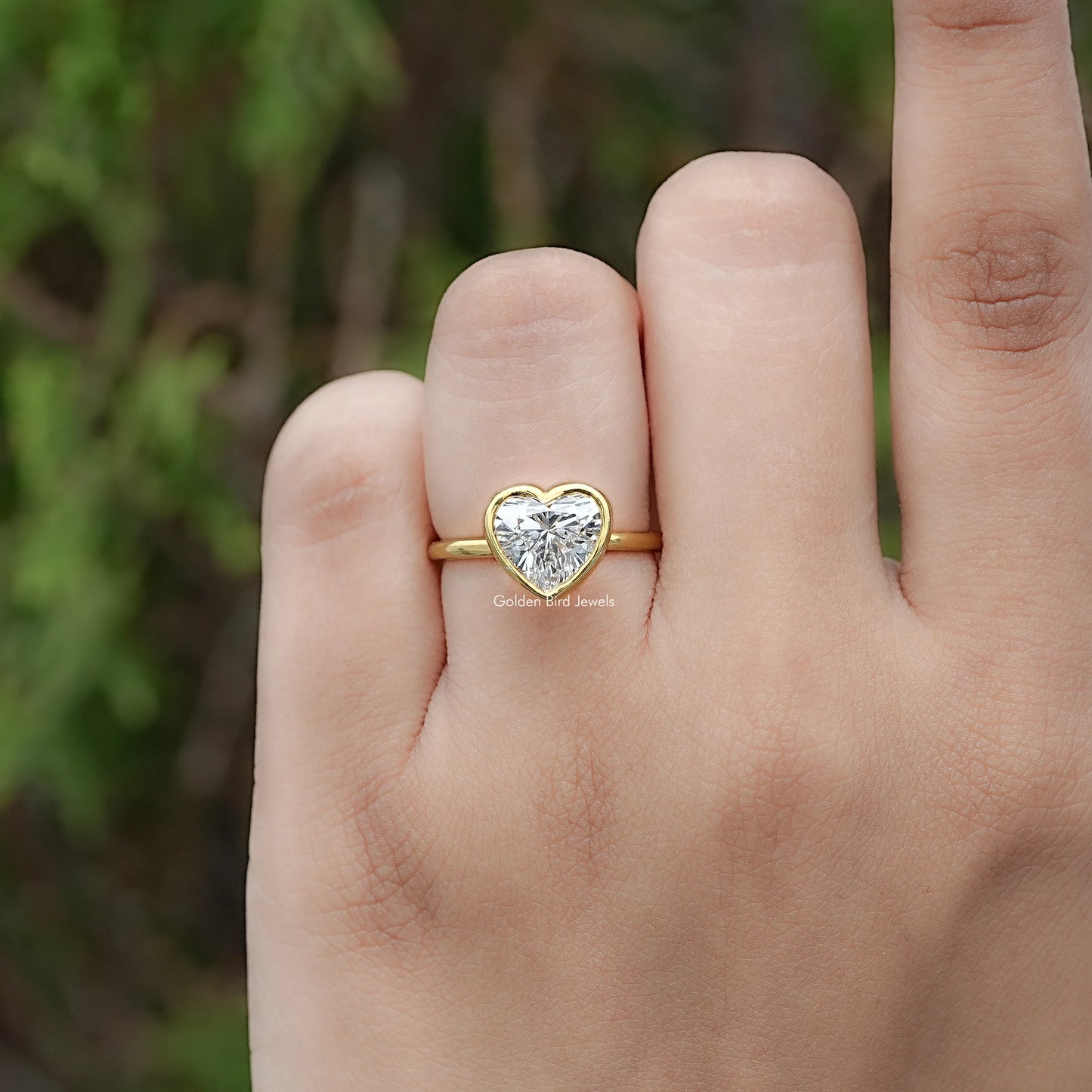 Front view of Heart Shaped Diamond Bezel Set Ring
