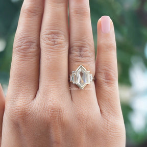 [In finger front view of hexagon cut five stone ring made of vvs clarity]-[Golden Bird Jewels]