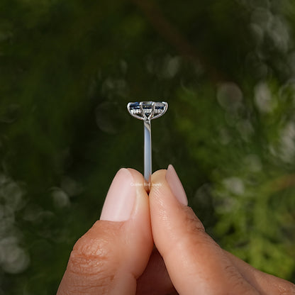 Marquise-cut blue gemstone ring with low prongs on silver band