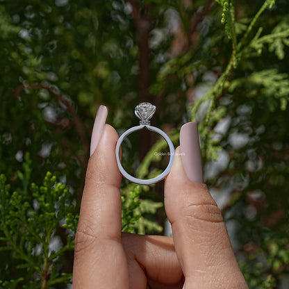 Oval moissanite solitaire ring, four-prong oval center on slender band