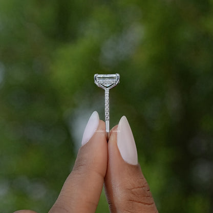 Prong setting close-up for radiant cut square moissanite solitaire ring on silver band