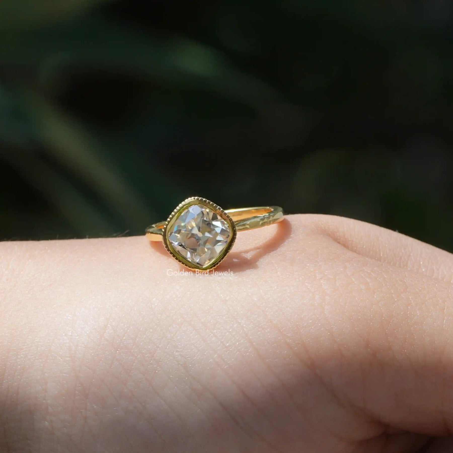 Close-Up View of Cushion Cut Hidden Halo Moissanite Ring In Yellow Gold