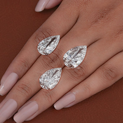 In hand Showing View Of Pear Cut Lab Diamond 